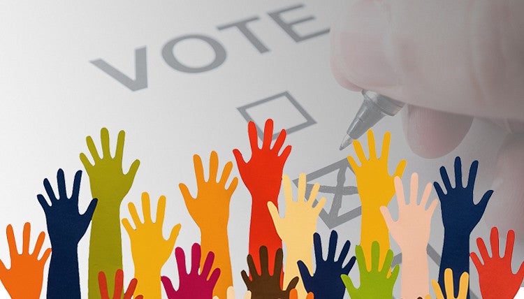 ballot getting filled out + raised hands in all colors. 